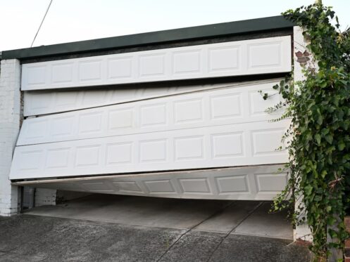 Hit Your Garage Door? What to Do If You Backed Into It | Door Pro America Inc.